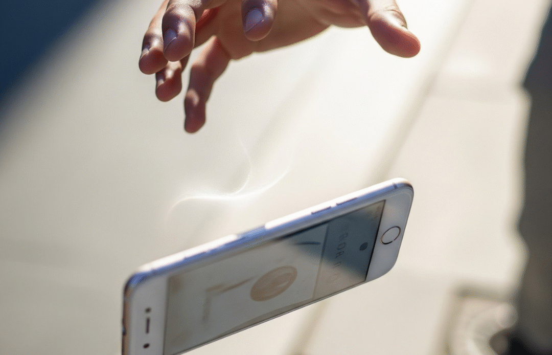 Phone falling from a hand